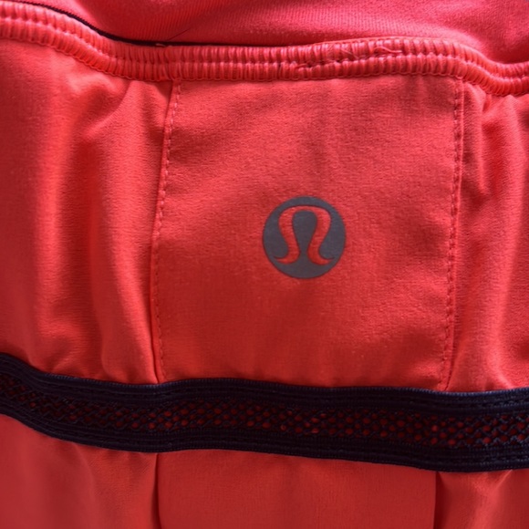 Lululemon Pace Setter Skirt. Bright orange and inkwell sea stripe. Size 2 - Picture 8 of 10